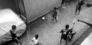 Urban Lens: A Rainy Day in Borneo Indonesia street football