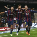 Barcelona’s Luis Suarez, Neymar and Lionel Messi celebrate a goal against Atletico Madrid during their Spanish First Division soccer match at Camp Nou stadium in Barcelona