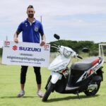 Marcus Haber with one of his three Suzuki Motorcycles